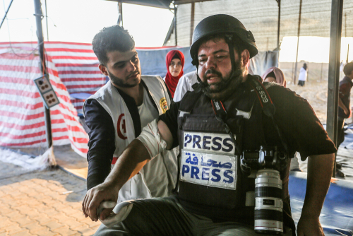 Photo-journalist Abed Rahim Khatib gets injured in his hand after Israeli forces' intervention during the "Great March of Return" rally at Israel-Gaza border in Gaza City, Gaza on November 01, 2019.  (By Anas Mohammed)