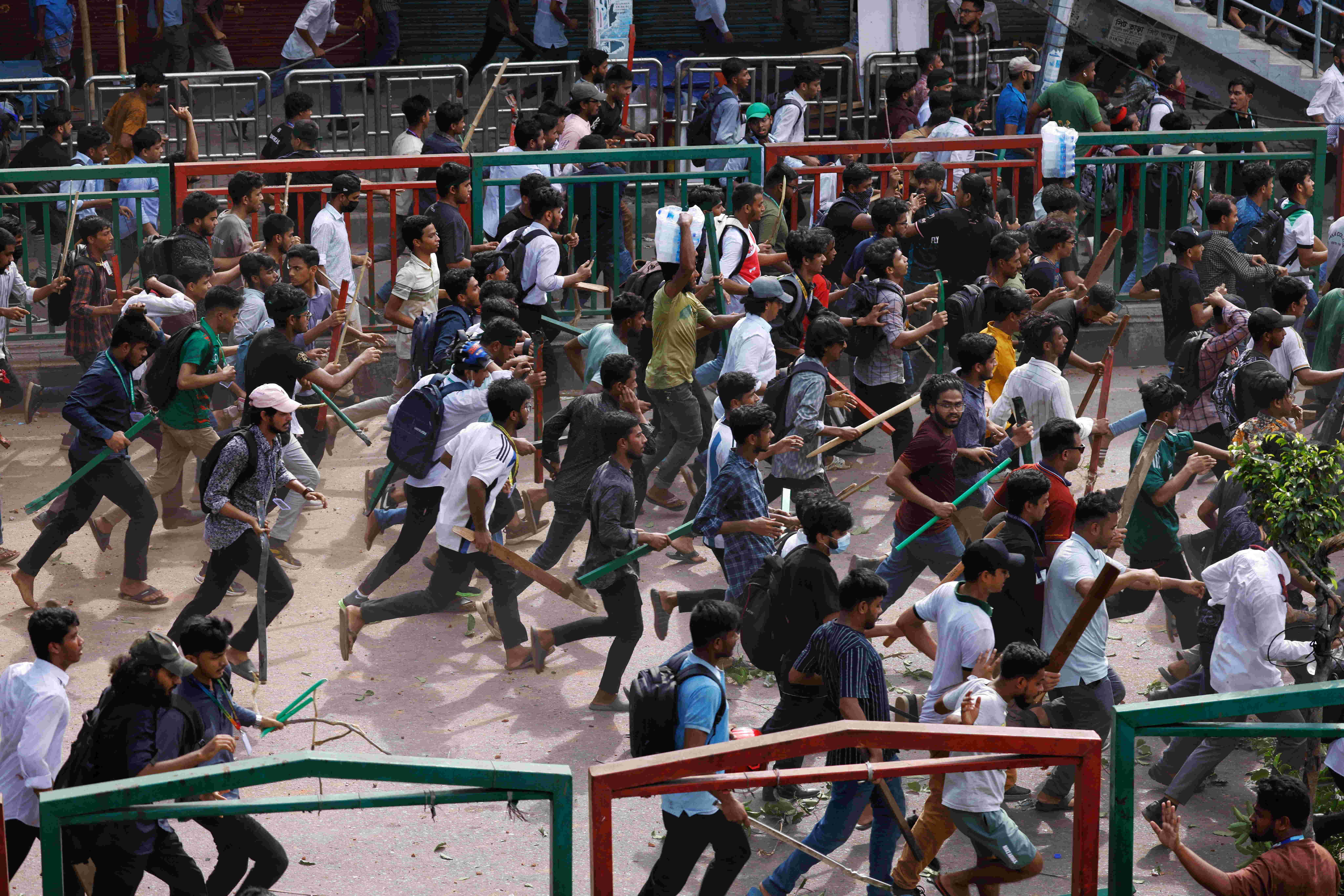 Bangladesh Chhatra League, the student wing of the ruling party Bangladesh Awami League, and anti-quota protesters engage in a clash at the Dhaka College area, in Dhaka, Bangladesh, July 16, 2024. Reuters