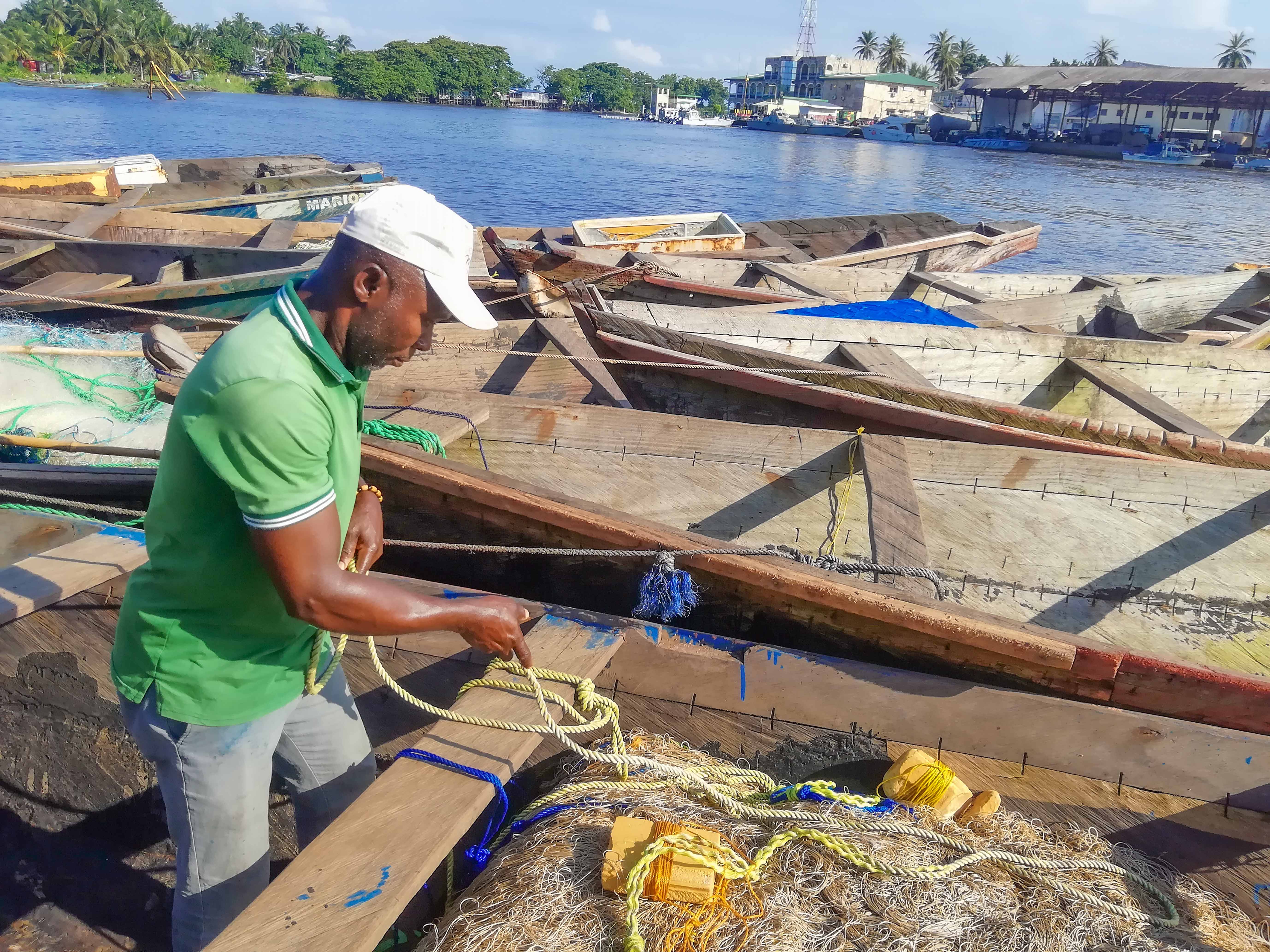 An artisanal fisher prepares his gear for an upcoming expedition, his only fear being the potential damage from trawlers. Mboa Manga beach, Kribi, Southwestern Cameroon.   (Photo: Shuimo Trust Dohyee )