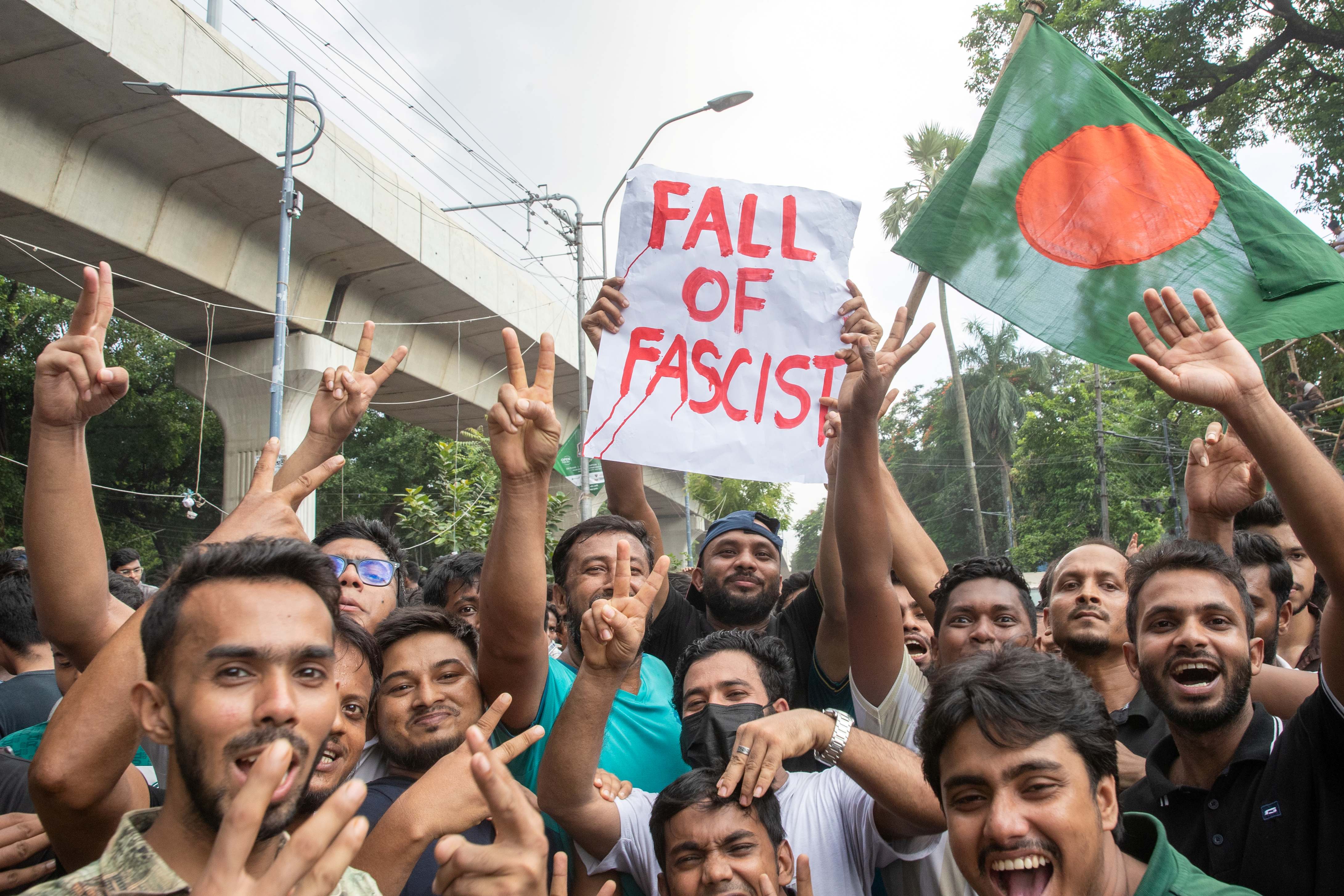 DHAKA, BANGLADESH - 2024/08/05: Anti-government protestors are celebrating in Shahbag after the fall of the country's Prime Minister Sheikh Hasina