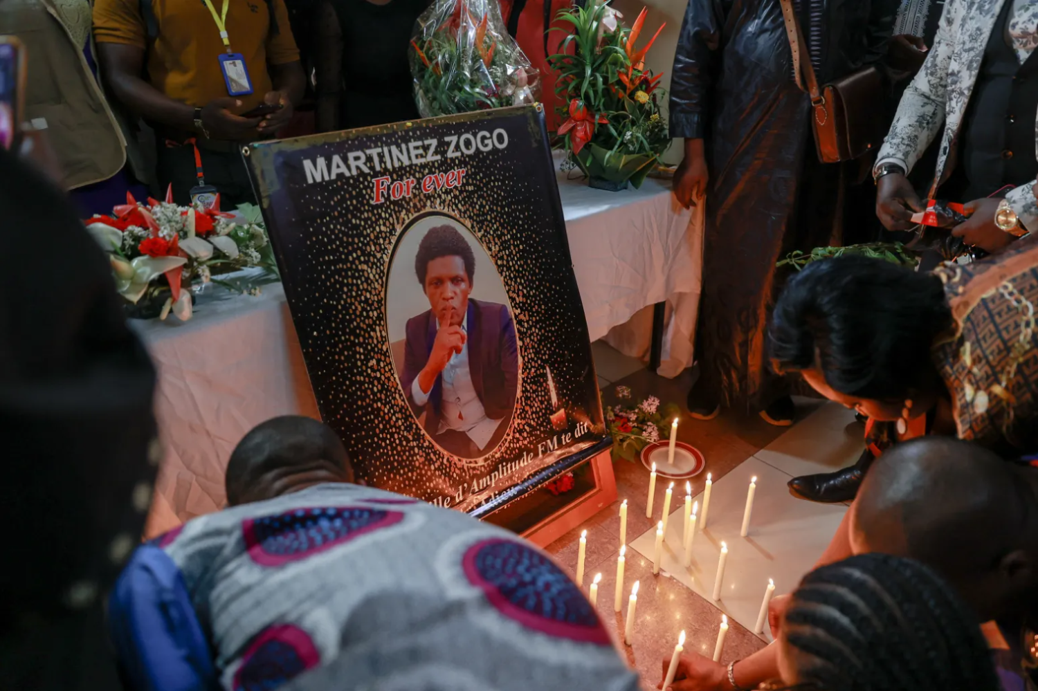   A memorial is seen for Amplitude FM journalist Martinez Zogo in Yaounde, Cameroon, on January 23, 2023. Zogo went missing on January 17 and was found dead on Sunday. (AFP/Daniel Beloumou Olomo)