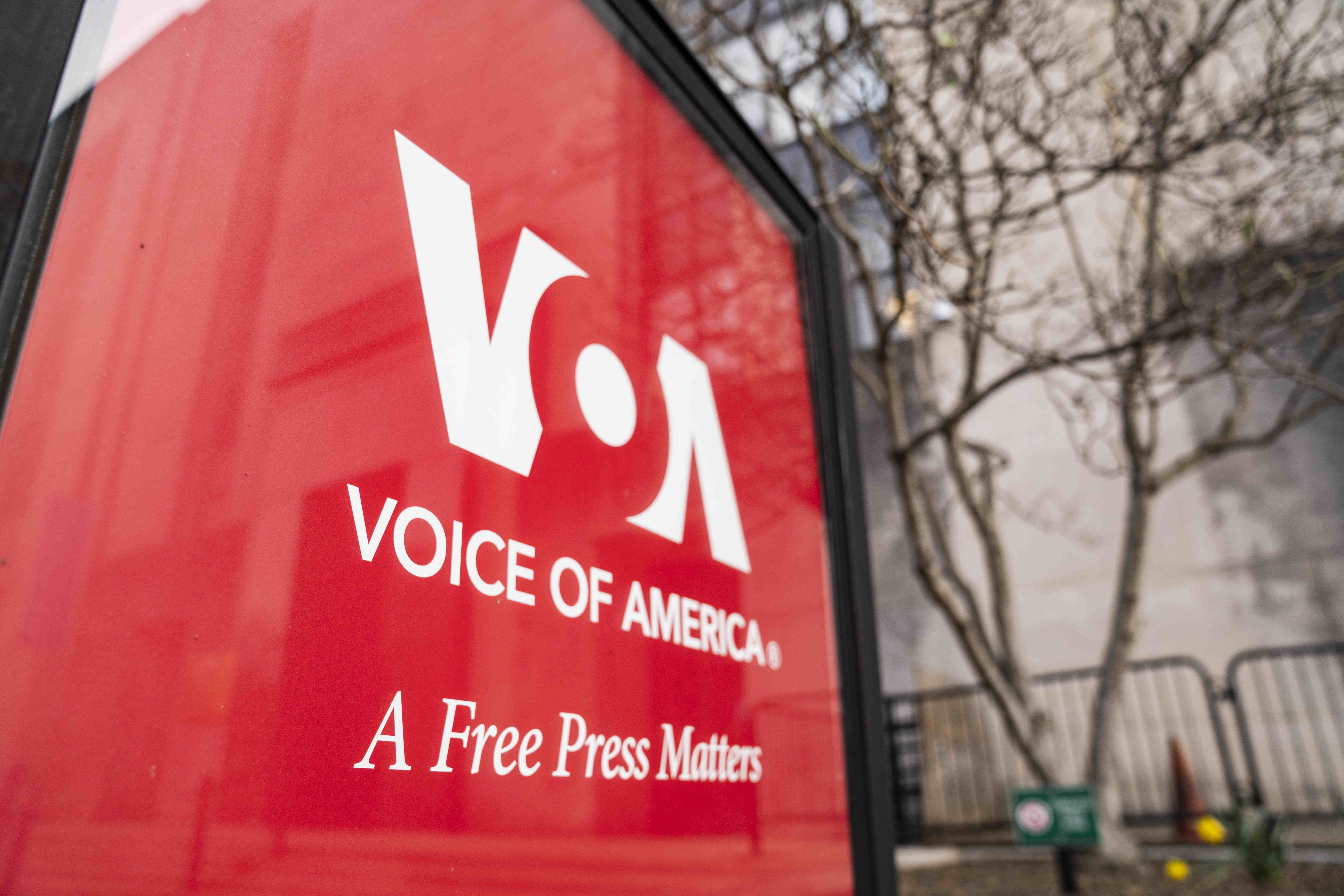 Voice of American banner on red
