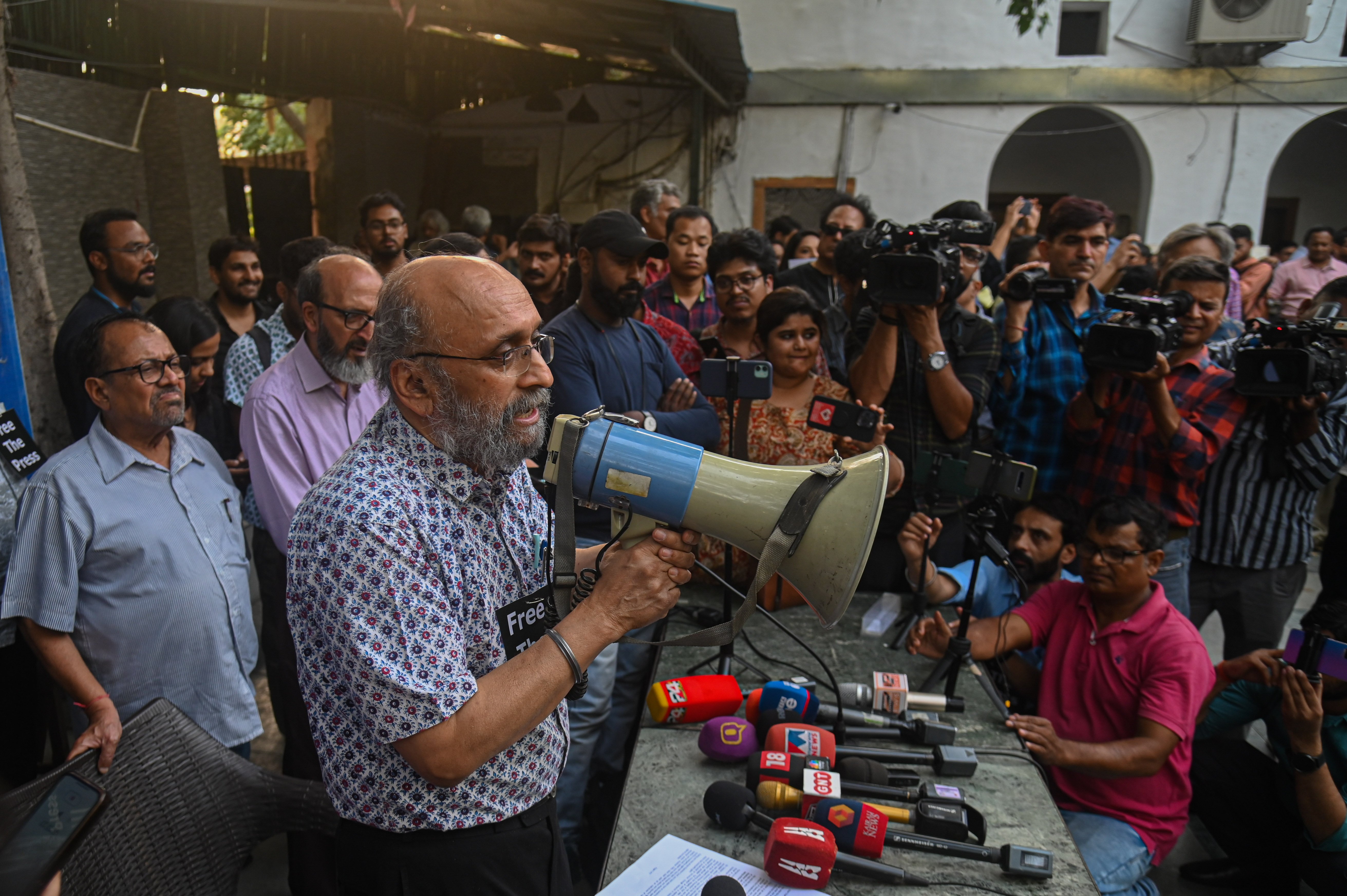 Senior journalist Paranjoy Guha Thakurta speaks during a demonstration protesting coordinated police raids on the homes of writers and media personnel associated with NewsClick, an independent Indian digital news portal known for critical journalism and coverage of progressive movements. The raids, initiated over allegations of illicit foreign funding, sparked widespread outrage among journalist bodies who condemned the crackdown as a direct assault on press freedom. (Photo: Kabir Jhangiani/ZUMA Press Wire.