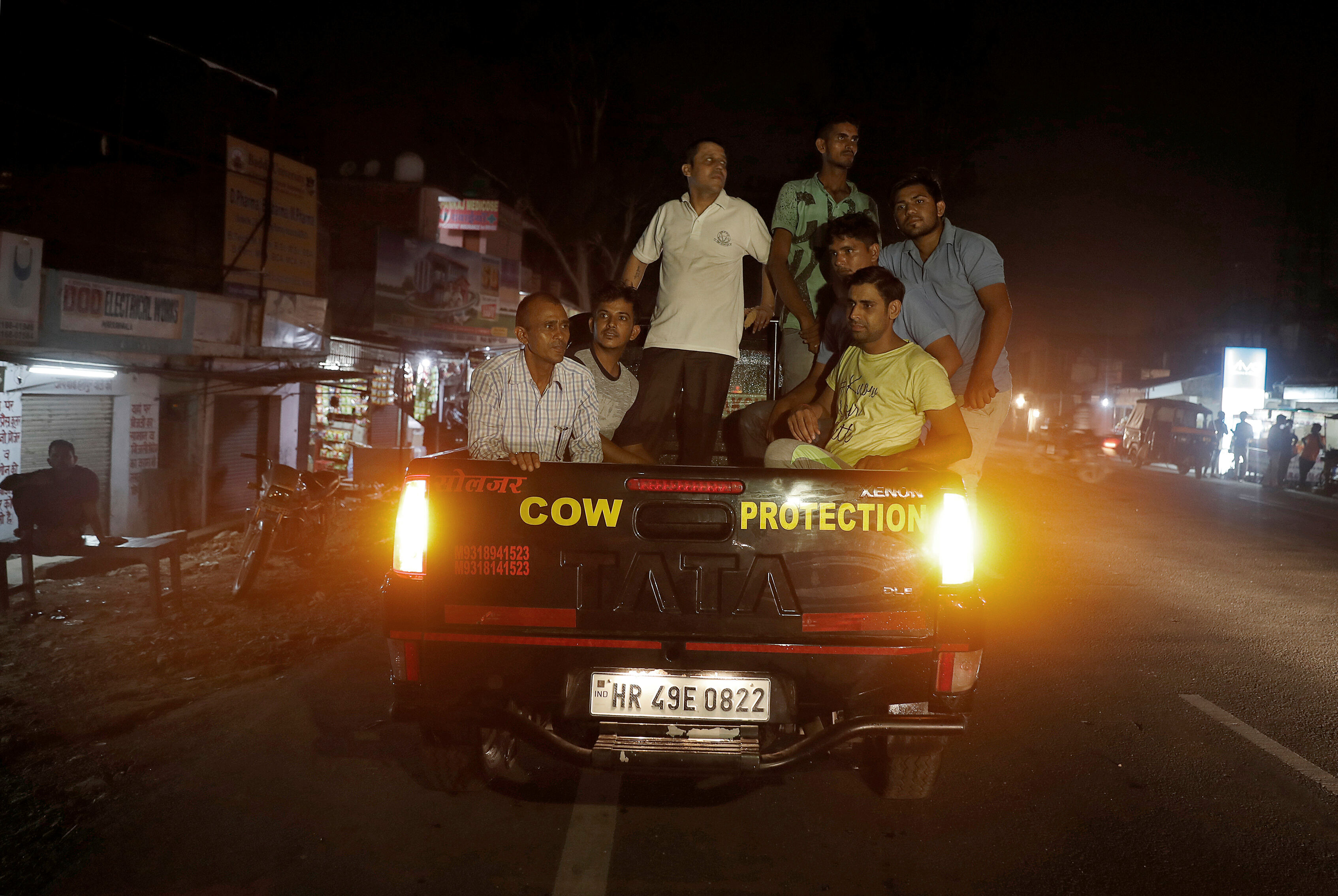 Cow vigilantes prepare to set up a road block near Chandigarh, India, July 6, 2017. Picture taken July 6, 2017. To match Special Report INDIA-POLITICS/RELIGION-COWS REUTERS/Cathal McNaughton