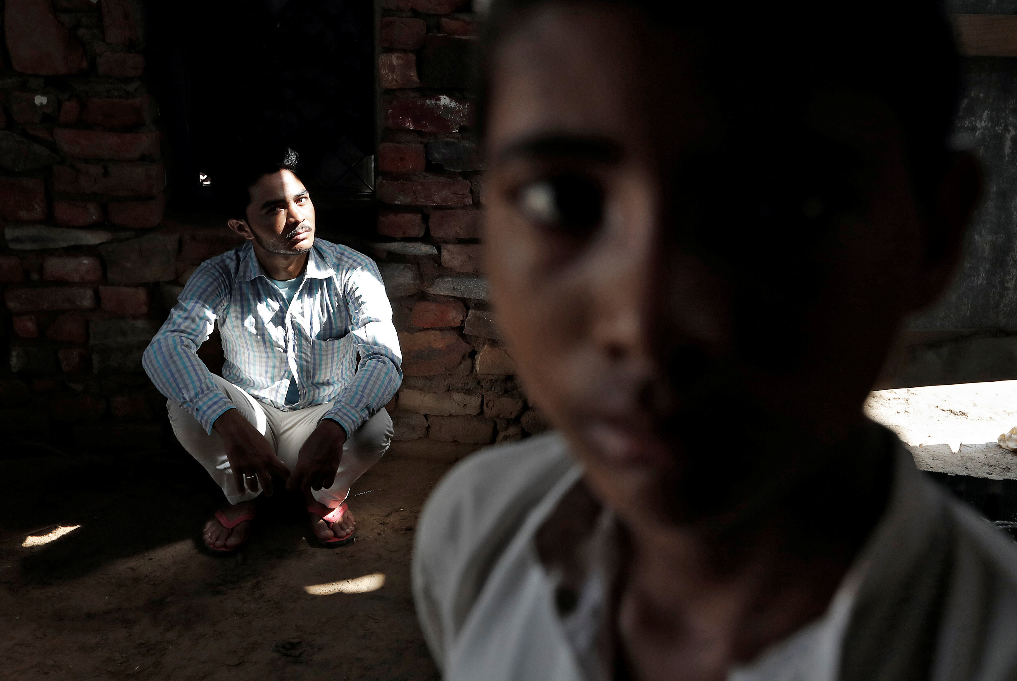 Irshad Khan, 24, pictured in the shed where his late father Pehlu, 55, slept in Jaisinghpur, India, June 2, 2017. Irshad survived an attack by cow vigilantes when transporting cattle which left his father dead and friends badly beaten. Picture taken June 2, 2017. To match Special Report INDIA-POLITICS/RELIGION-COWS REUTERS/Cathal McNaughton