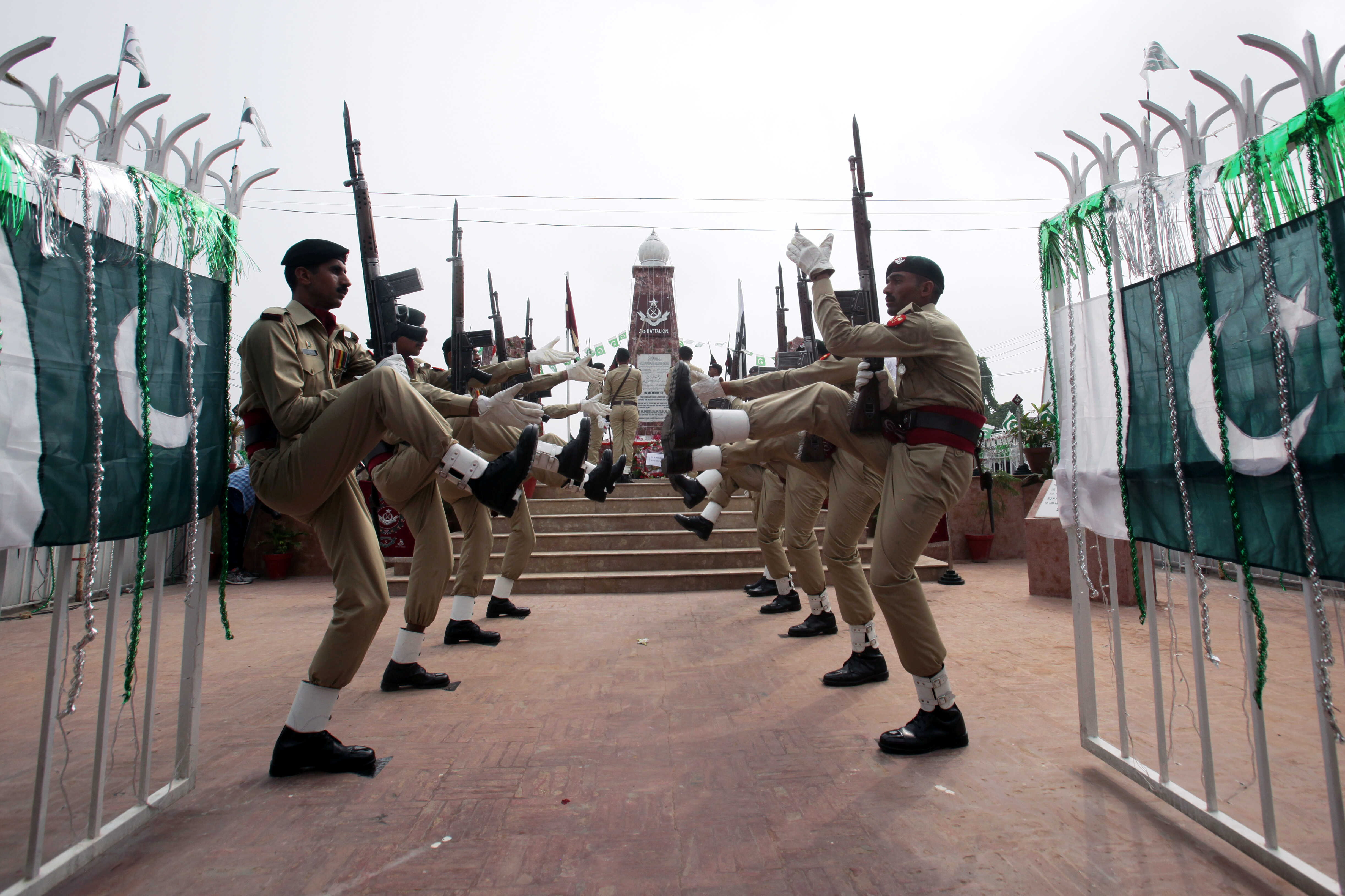 Army honor guards pay tribute at the war monument, during Defence Day ceremonies, or Pakistan's Memorial Day, to express solidarity with the people of Kashmir, at Wagah border, near Lahore, Pakistan, September 6, 2019. REUTERS/Mohsin Raza