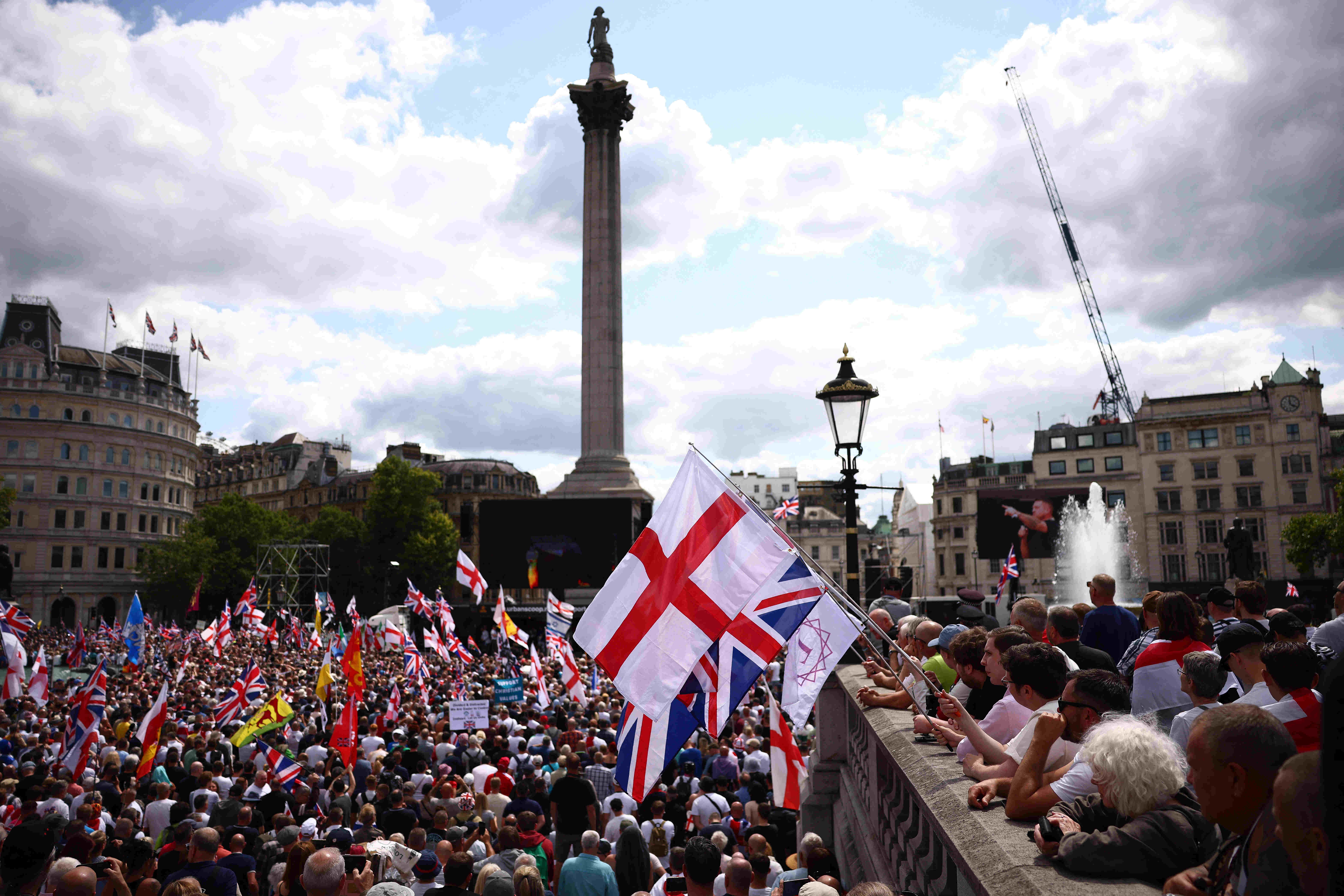 anti-Islam English Defence League (EDL), Stephen Yaxley-Lennon, also known as Tommy Robinson attend a rally at Trafalgar square in central London on July 27, 2024