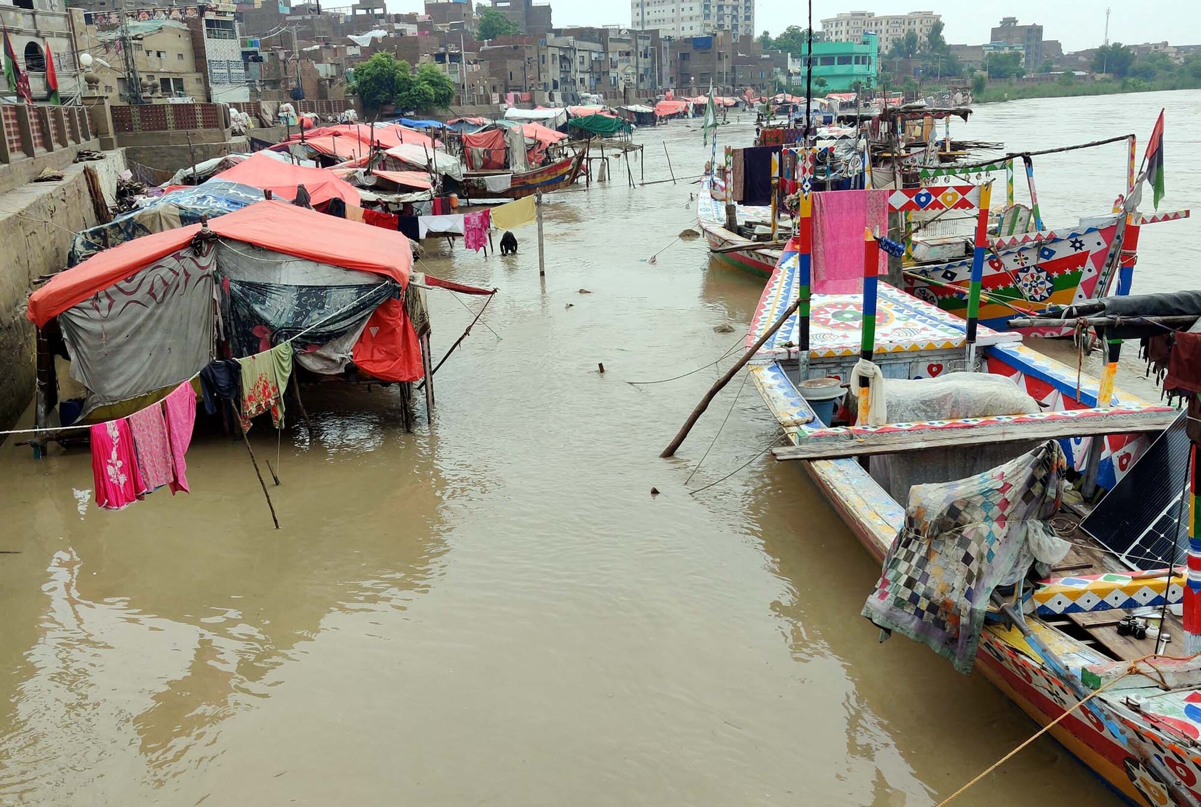 SUKKUR, PAKISTAN - AUG 22: View of stagnant water after low-level flood at Indus River while flood water entered riverside settlements, showing negligence of authorities, on August 22, 2022 in Sukkur.  By Asianet-Pakistan