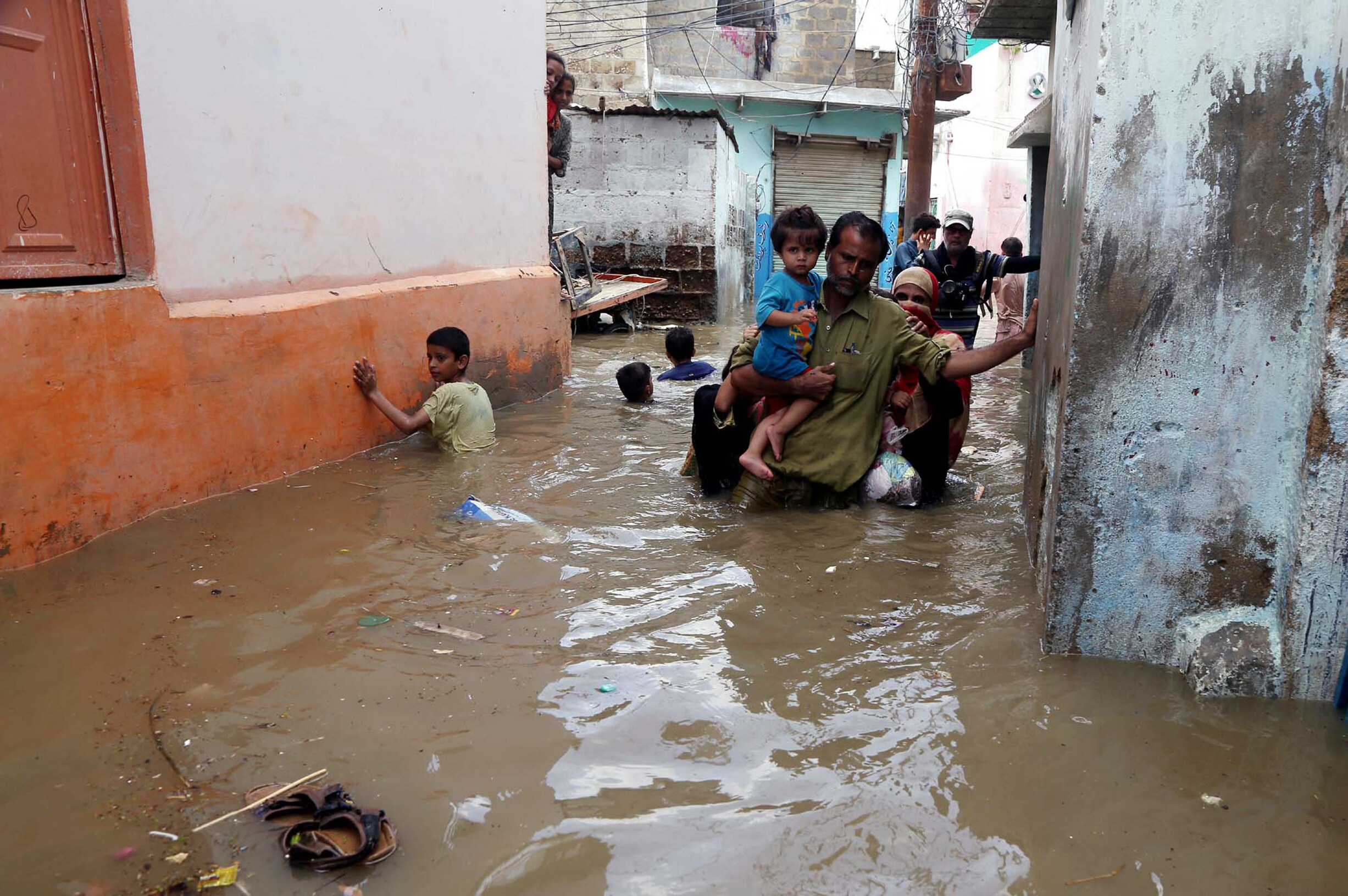 KARACHI, PAKISTAN - AUG 22: Residents are facing difficulties due to flooded area caused by heavy downpour of monsoon season due to poor sewerage system, on August 22, 2020 in Karachi.   By Asianet-Pakistan