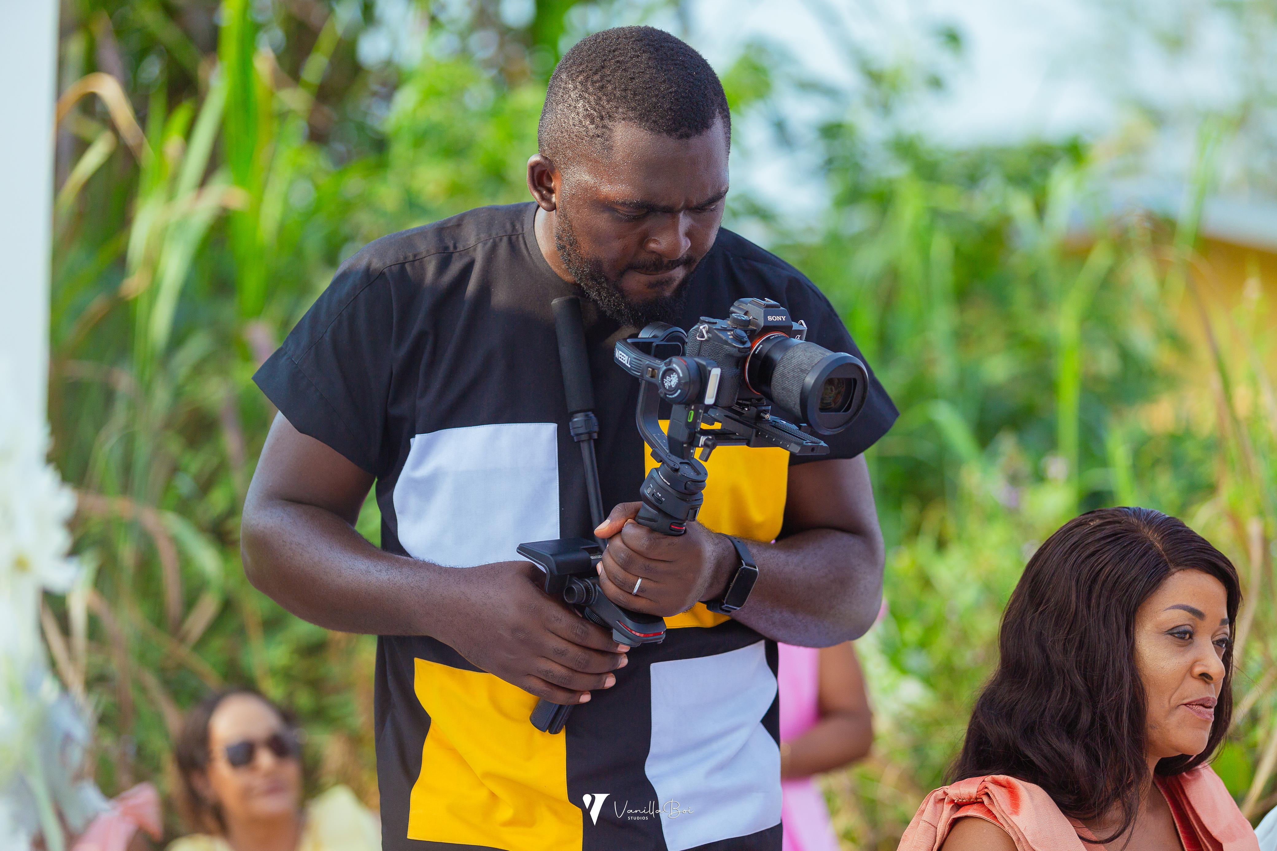 Glen Amungwa, a mobile photojournalist, captures significant moments for future reference. Credit: Vanillaboi Studios.