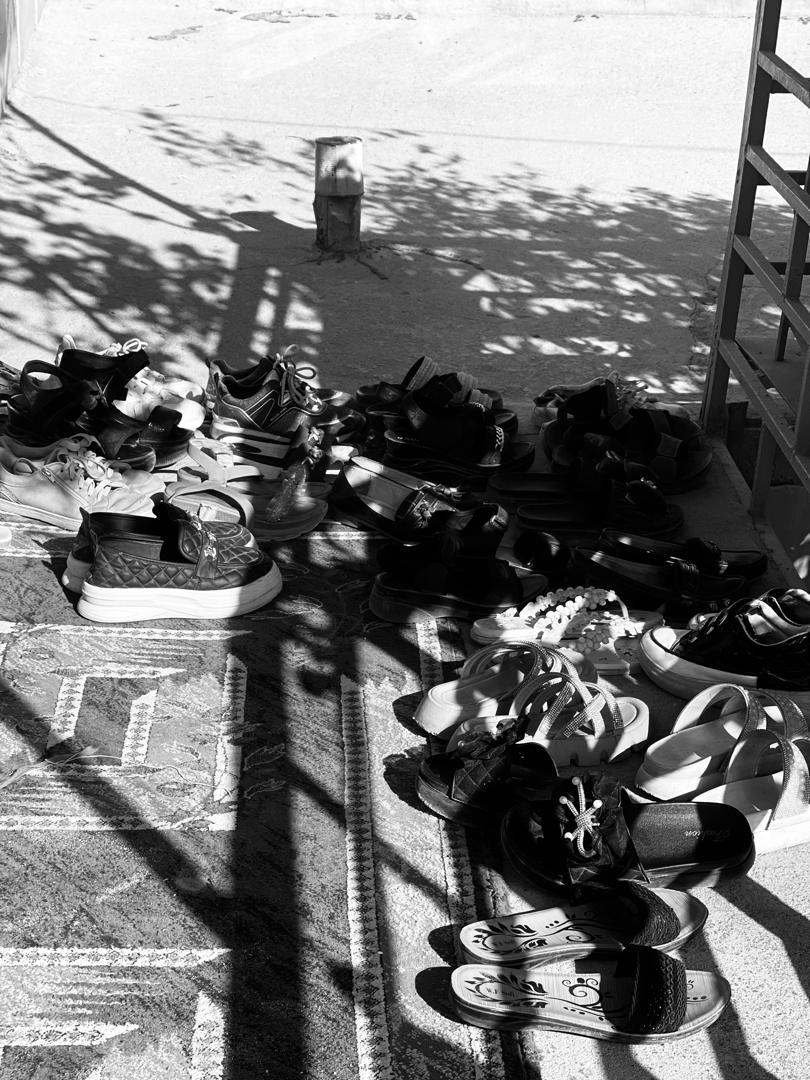 shoes of girls in a home school in kabul