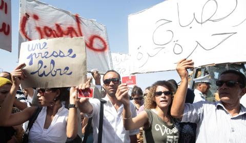 ournalists protest against a government appointed director for a media group, in front of the prime minister's office in Tunis September 28, 2012.