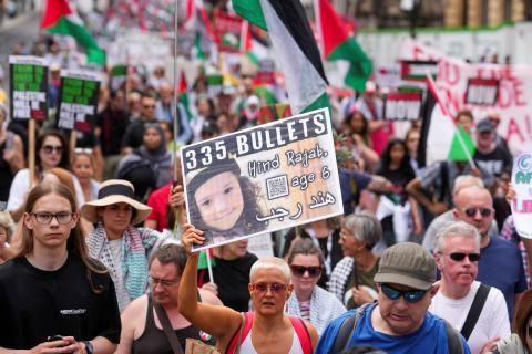 Pro-Palestine demonstration A woman holding Hind Rajab Picture