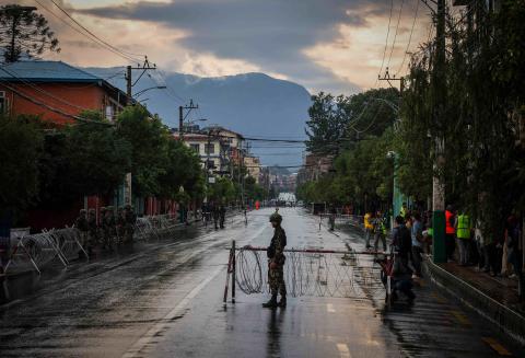 A burnt police vehicle is pictured inside the Federal Parliament after the Gen Z protests in Kathmandu, Nepal , on Wednesday, September 10, 2025