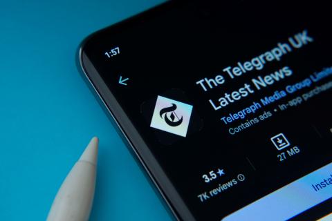 A mobile screen with The Telegraph on it 