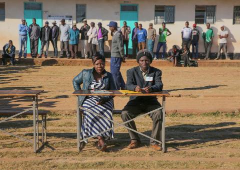 Zimbabweans vote for Zimbabwe National Elections, Shamva  Election inspectors at a polling station at the Shamva Mine Primary School in Mashonaland East during the 2018 National Elections on July 30, 2018. This is the first national election since former President Robert Mugabe stepped down as President of Zimbabwe on November 21, 2017 after a military take over 6 days prior that ended 37 years of rule.  By: Jemal Countess  Date created: Jul 30 2018