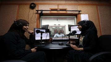 Two female presenters at a radio station in Sanaa on April 22, 2014. Photo by Khaled Abdullah - Reuters.
