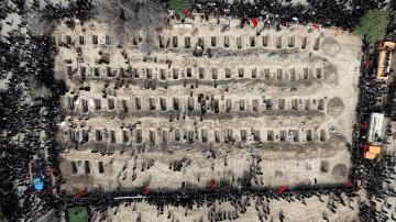 Mourners dig graves during a mass funeral for children killed in a U.S.-Israeli airstrike on a primary school in Minab, Hormozgan Province. The bombardment resulted in the deaths of more than 175 female students, drawing hundreds of grieving community members to the site to memorialize the victims. The tragedy has intensified local and international outcry regarding the escalating conflict involving the United States, Israel, and Iran. (Photo: Iranian Red Crescent. Tehran, Iran – Mar 04, 2026)